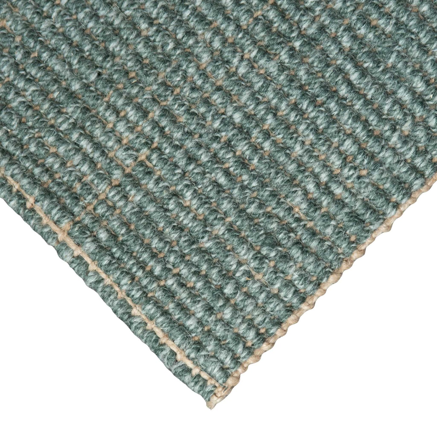 Close-up of Carter Forest handcrafted marled green wool and jute bouclé rug on white background.