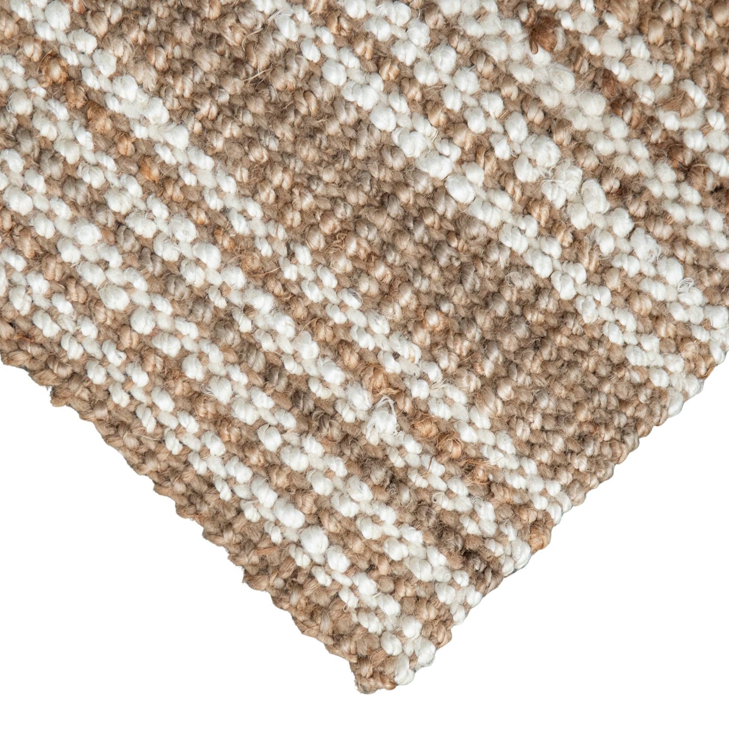 Close up of Handcrafted Osbourne natural chunky jute bouclé rug with white stripes and white background.