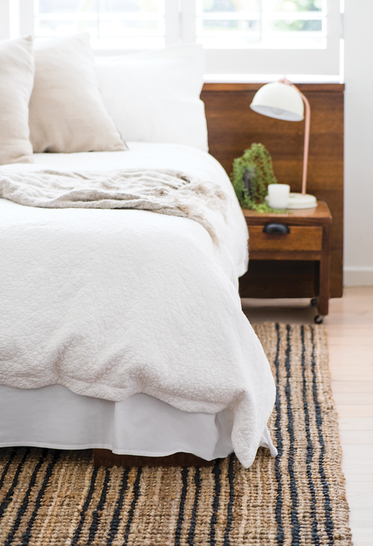 How to style your rug in the bedroom