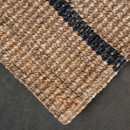 Handcrafted bailey stripe chunky jute bouclé runner close up in a natural color with graphite stripe.