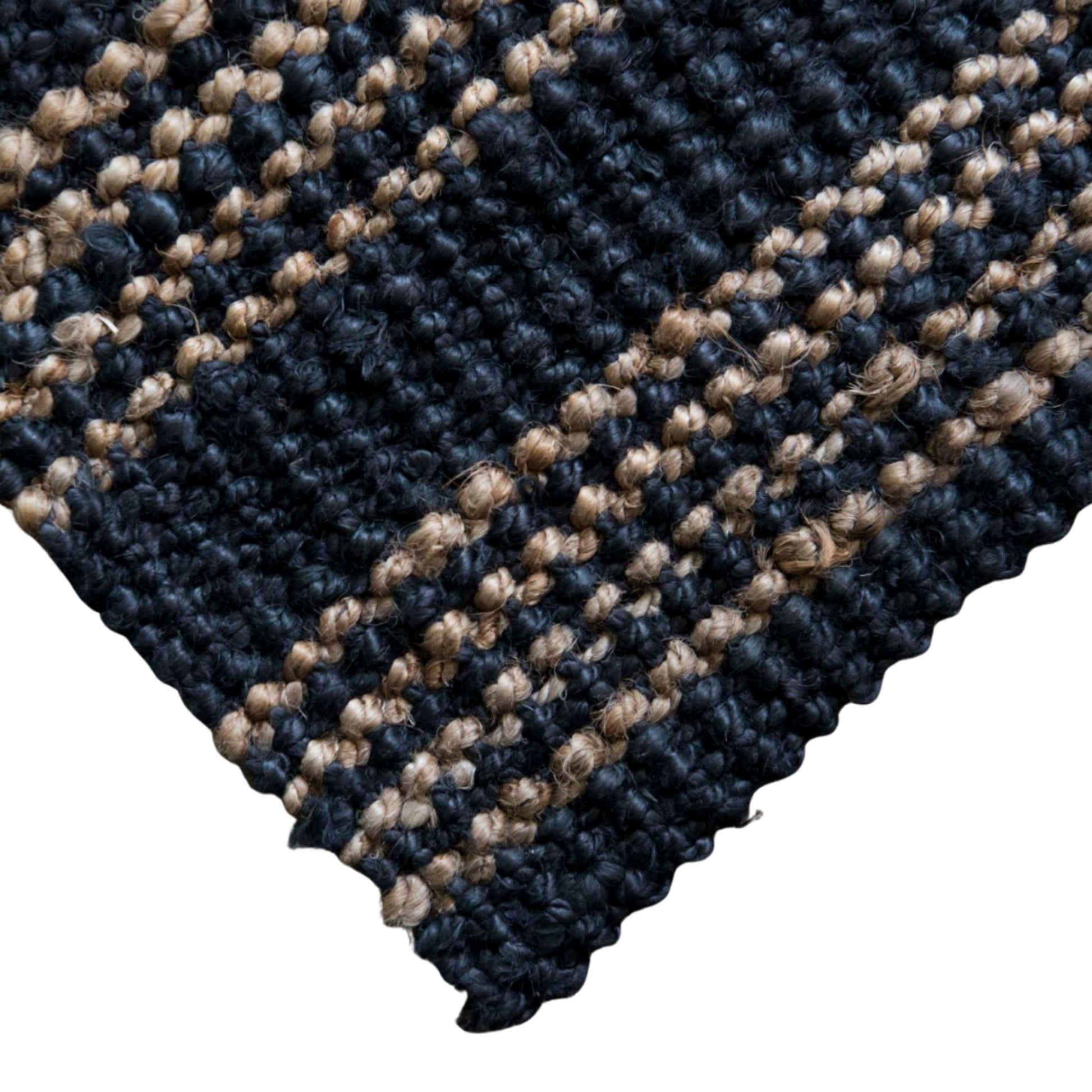 Close-up of the graphite Jones woven boucle texture and natural stripe.