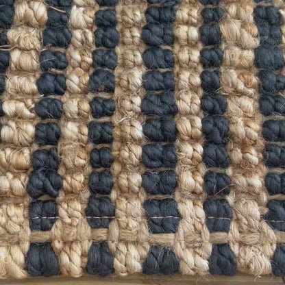 Close-up video of the woven bouclé  texture and white stripes on the Caravan rug.